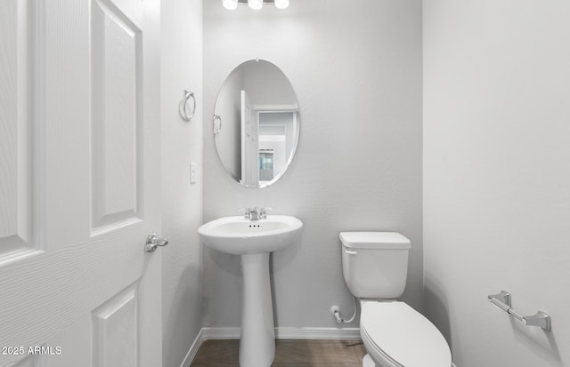 bathroom with sink and toilet