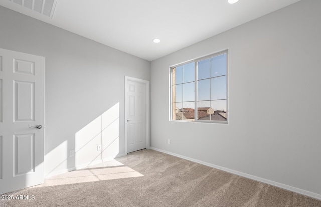 view of carpeted spare room