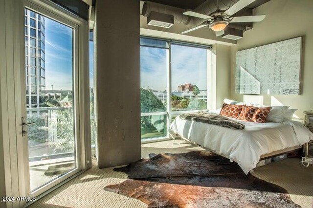1 E Lexington Ave Unit 410, Phoenix, AZ 85012 - carpeted bedroom with ceiling fan and a view of city