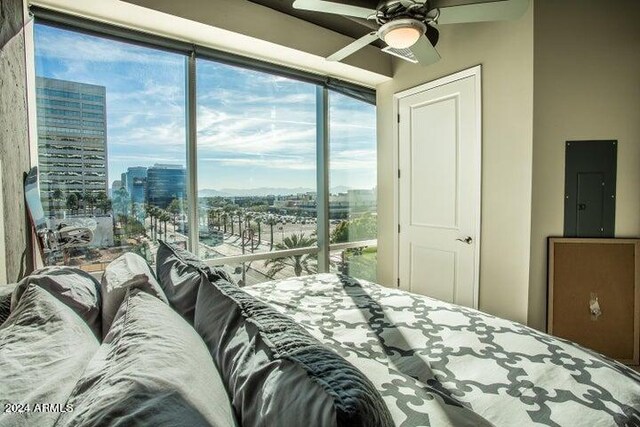 1 E Lexington Ave Unit 410, Phoenix, AZ 85012 - bedroom with electric panel, a city view, access to exterior, and a ceiling fan