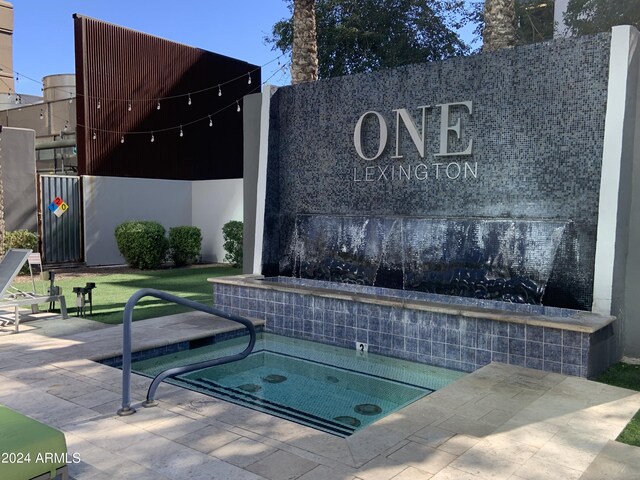 1 E Lexington Ave Unit 410, Phoenix, AZ 85012 - view of pool featuring a community hot tub and a patio area
