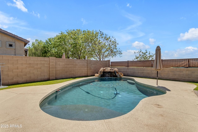 view of pool featuring a fenced in pool, a patio, and a fenced backyard
