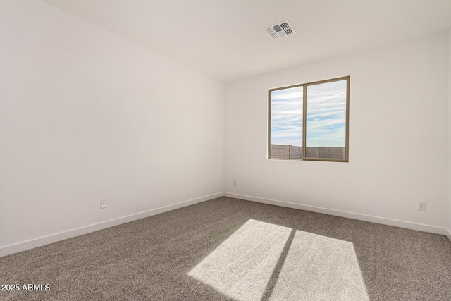 empty room with carpet flooring