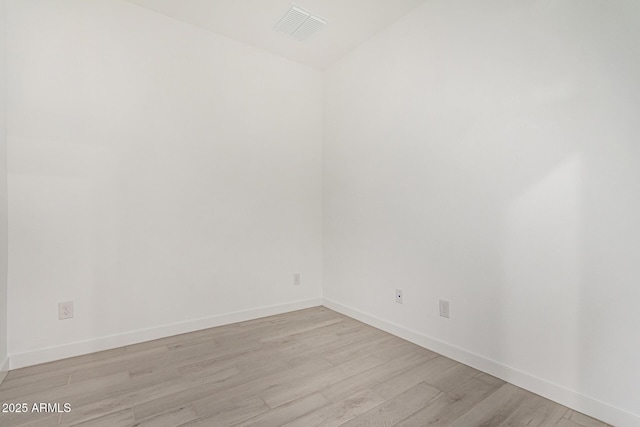 empty room with light wood-type flooring