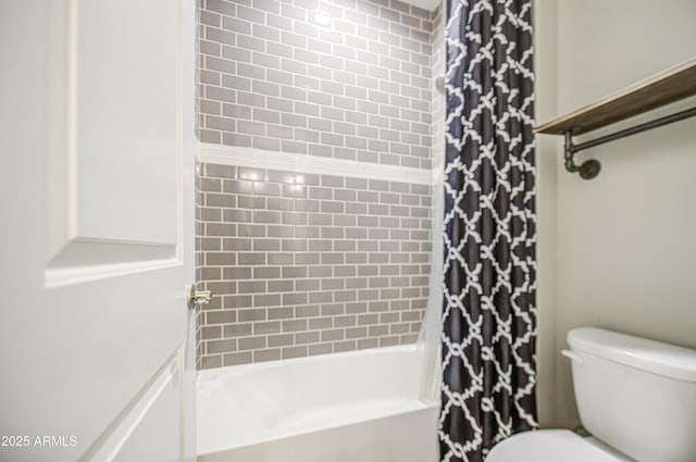 full bath featuring toilet and shower / bathtub combination with curtain
