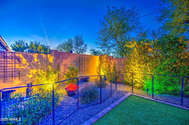 view of yard featuring a fenced backyard