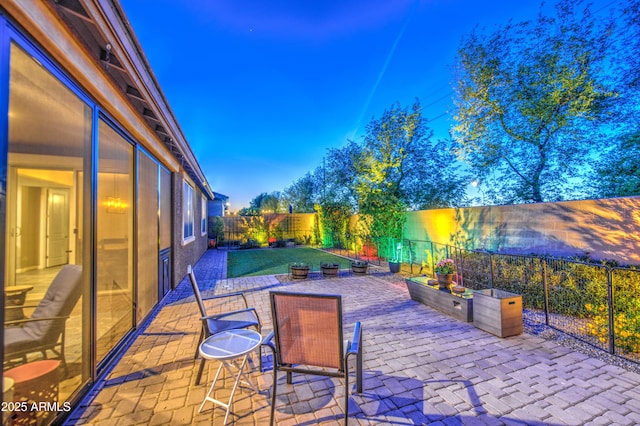 view of patio featuring a fenced backyard