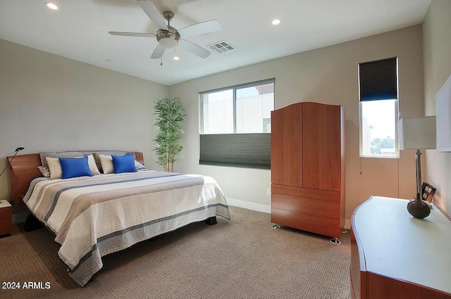 bedroom featuring recessed lighting, visible vents, light colored carpet, and a ceiling fan