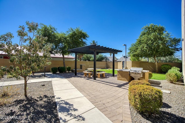 view of patio featuring a fenced backyard and a pergola