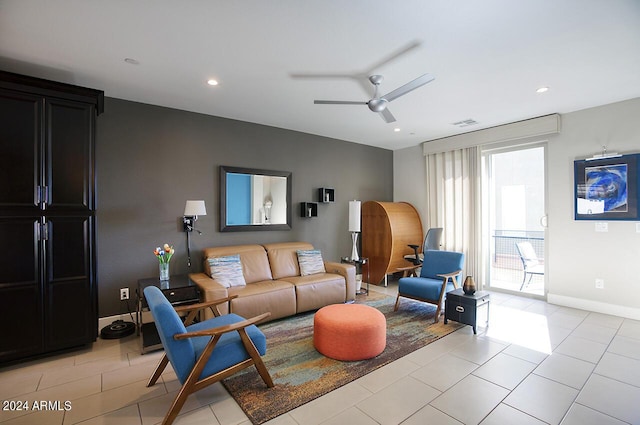 living area with visible vents, a ceiling fan, recessed lighting, light tile patterned flooring, and baseboards