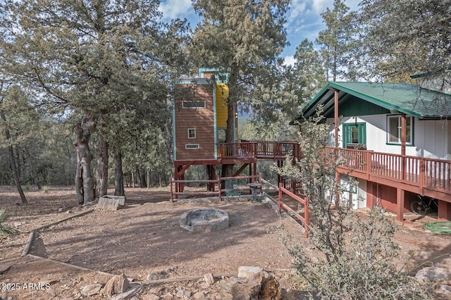 2974 N Vista Way, Payson, AZ 85541 - rear view of house featuring a wooden deck and a fire pit