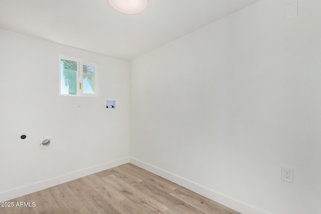 laundry room with light hardwood / wood-style floors, washer hookup, and hookup for an electric dryer