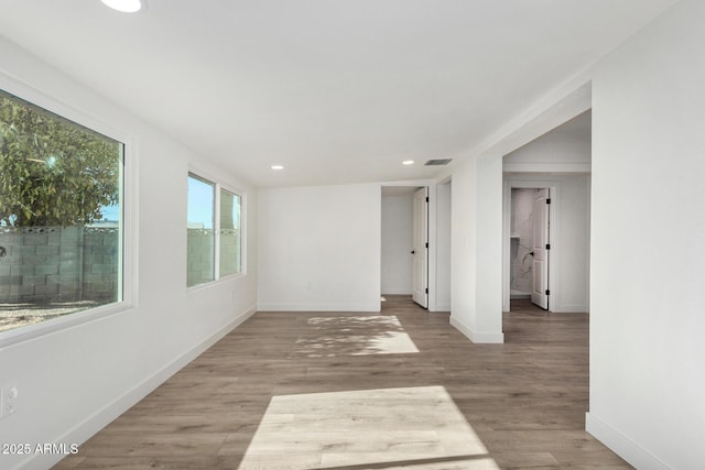 spare room with light wood-type flooring