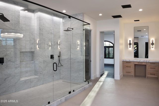 full bathroom with recessed lighting, a shower stall, vanity, and baseboards