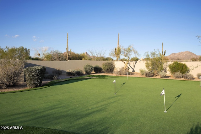 view of property's community with a fenced backyard