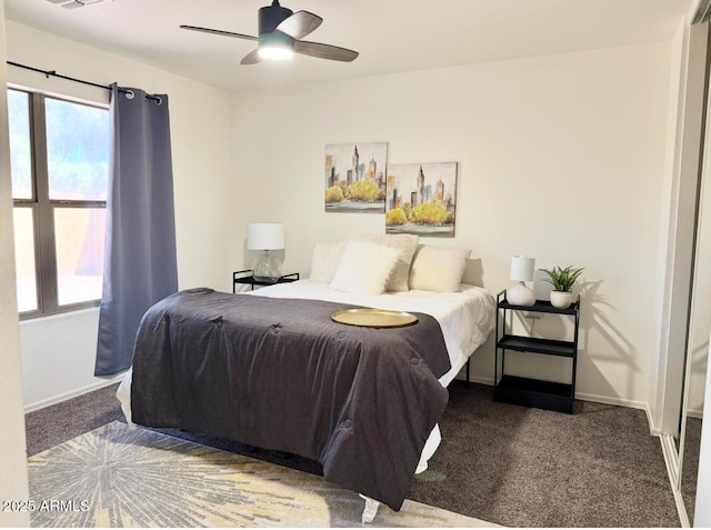 bedroom featuring baseboards, carpet, a ceiling fan, and visible vents