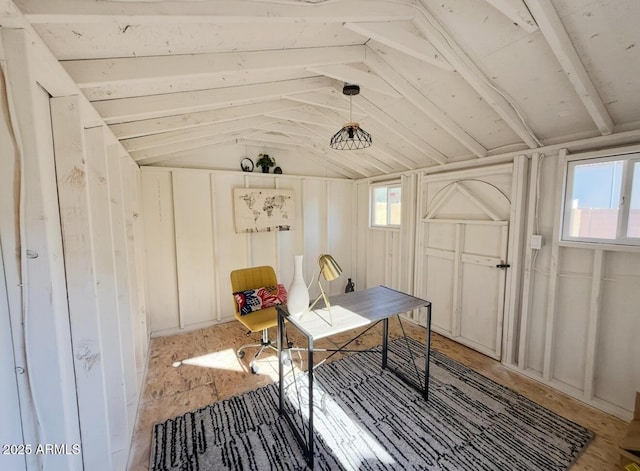 home office featuring vaulted ceiling