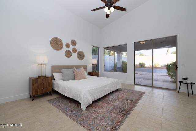 tiled bedroom featuring high vaulted ceiling, access to outside, and ceiling fan