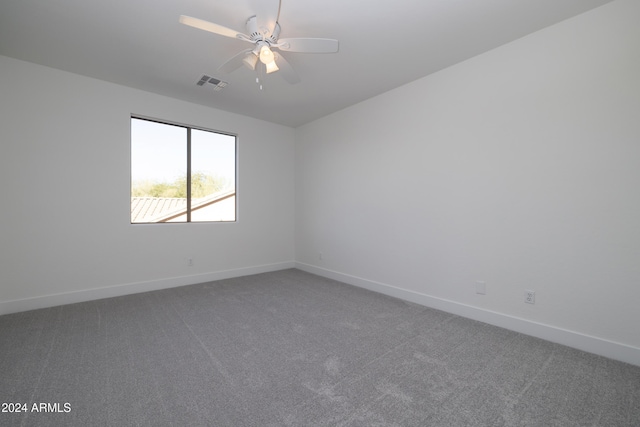 carpeted empty room with ceiling fan