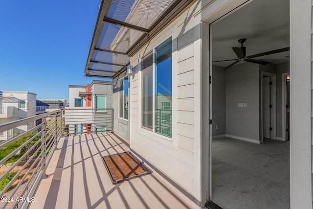 balcony featuring ceiling fan