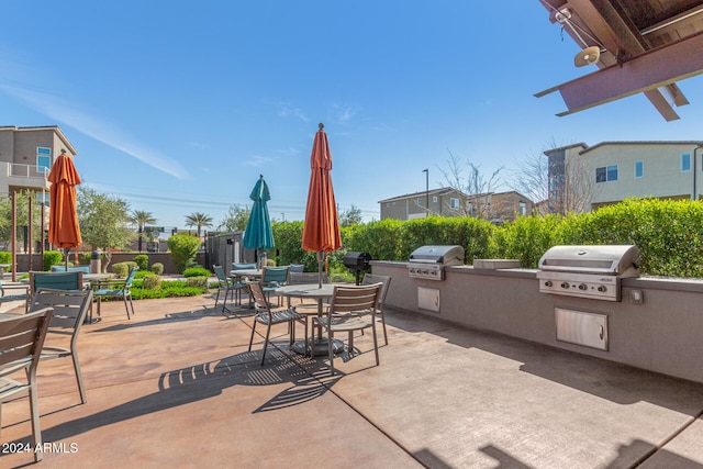 view of patio / terrace featuring exterior kitchen and area for grilling