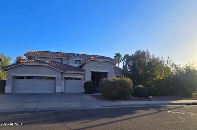 view of front of property featuring a garage