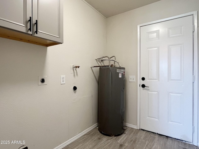 washroom featuring cabinets, light wood-type flooring, water heater, and electric dryer hookup