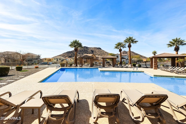 view of pool featuring a gazebo and a patio