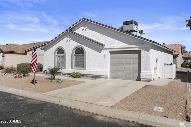 1881 E Kerby Farms Rd, Chandler, AZ 85249 - view of front of property featuring an attached garage, concrete driveway, and stucco siding