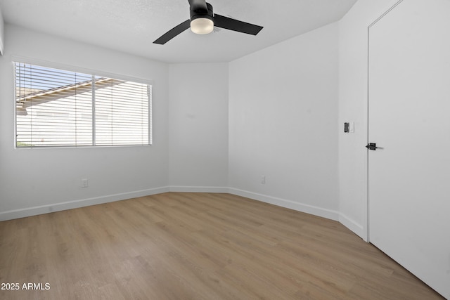 1881 E Kerby Farms Rd, Chandler, AZ 85249 - spare room with light wood finished floors and ceiling fan