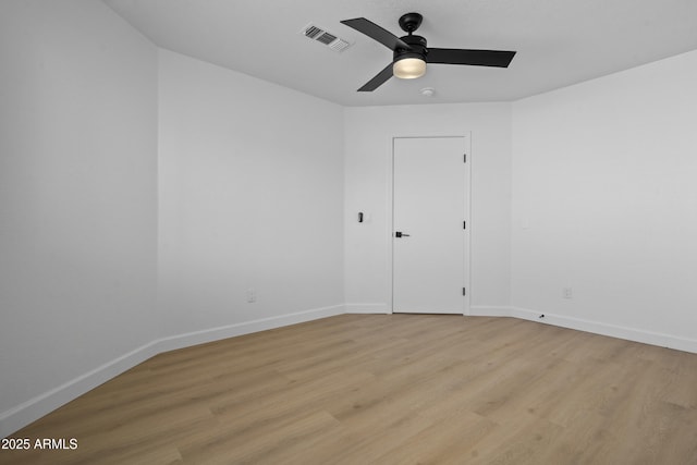 1881 E Kerby Farms Rd, Chandler, AZ 85249 - spare room with a ceiling fan and light wood-style flooring