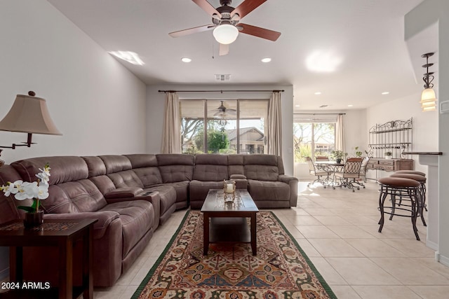 living area featuring recessed lighting, visible vents, ceiling fan, and light tile patterned floors