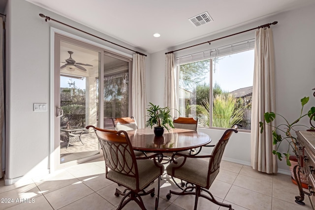 dining space featuring light tile patterned floors, recessed lighting, visible vents, and baseboards