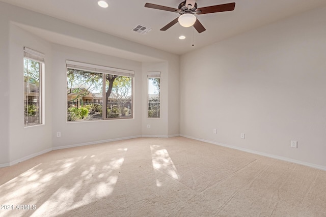 spare room with baseboards, a ceiling fan, visible vents, and recessed lighting