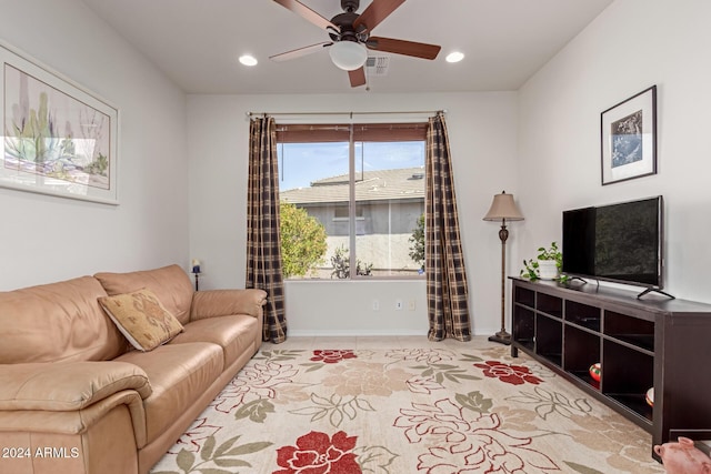 living area with ceiling fan, visible vents, and recessed lighting