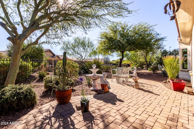 view of patio / terrace featuring fence and outdoor dining space