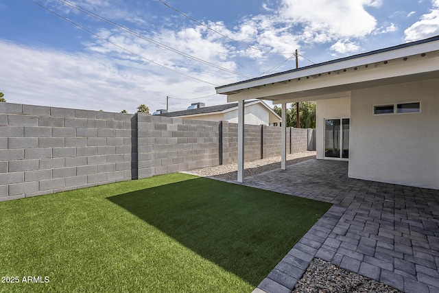 view of yard with a patio area