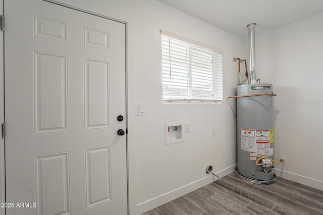 utility room featuring gas water heater