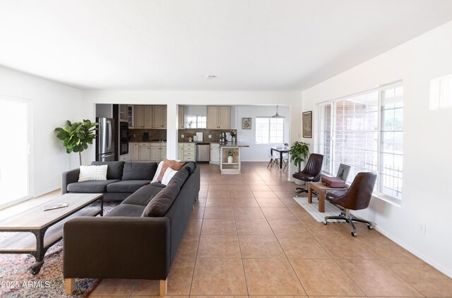 1330 E Monte Vista Rd, Phoenix, AZ 85006 - living area with light tile patterned floors and baseboards