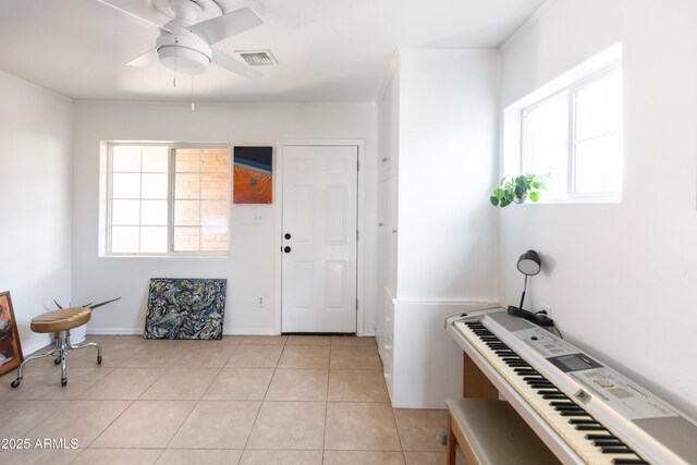 1330 E Monte Vista Rd, Phoenix, AZ 85006 - foyer entrance featuring plenty of natural light, light tile patterned flooring, and a ceiling fan