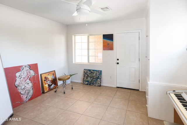 1330 E Monte Vista Rd, Phoenix, AZ 85006 - foyer entrance with ceiling fan and light tile patterned floors