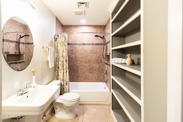1330 E Monte Vista Rd, Phoenix, AZ 85006 - bathroom featuring toilet, tile patterned flooring, shower / bath combo with shower curtain, and a sink