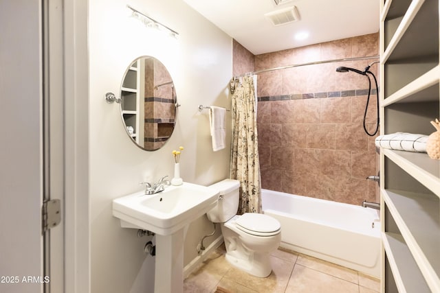 1330 E Monte Vista Rd, Phoenix, AZ 85006 - bathroom featuring toilet, tile patterned floors, and shower / bath combo