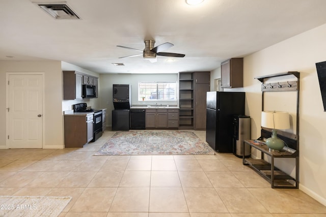 1330 E Monte Vista Rd, Phoenix, AZ 85006 - kitchen with black appliances, a sink, ceiling fan, light tile patterned floors, and open shelves