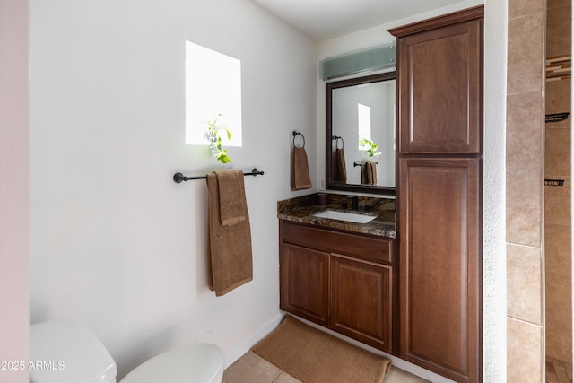 1330 E Monte Vista Rd, Phoenix, AZ 85006 - bathroom with toilet, vanity, baseboards, and tile patterned floors