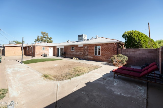 1330 E Monte Vista Rd, Phoenix, AZ 85006 - back of house with a patio, brick siding, and central AC unit