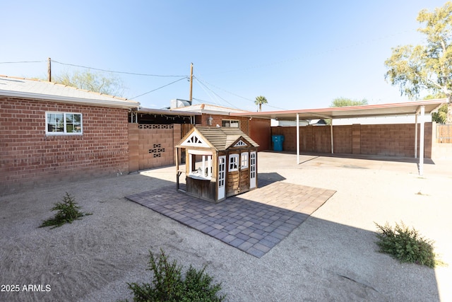 1330 E Monte Vista Rd, Phoenix, AZ 85006 - view of patio / terrace featuring fence and an outbuilding