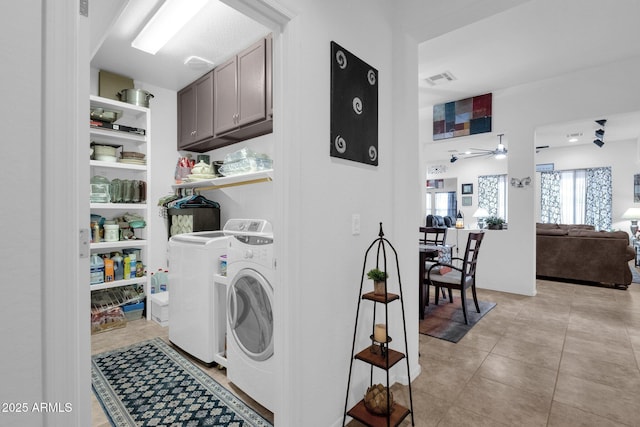 washroom with light tile patterned flooring, ceiling fan, and independent washer and dryer