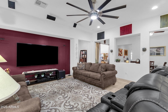 living room featuring ceiling fan