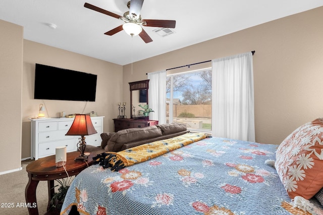 carpeted bedroom featuring ceiling fan